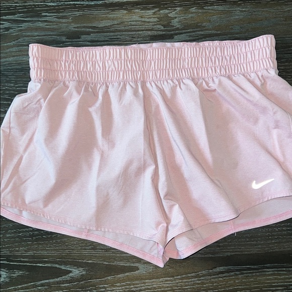 Nike Pants - Nike dri fit light pink running shorts Large built in underwear